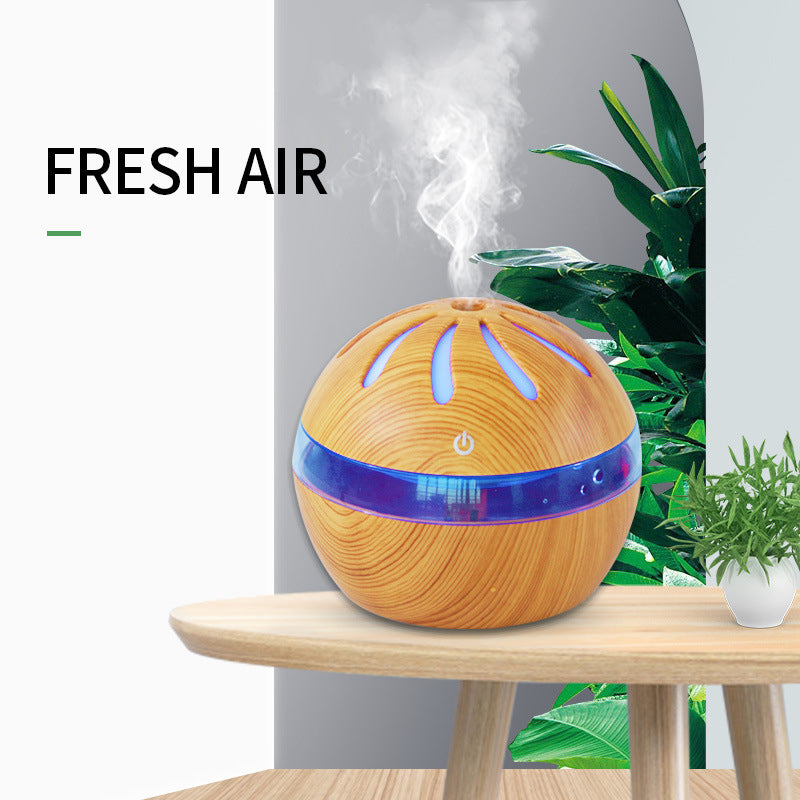 Windmill Aroma Diffuser showing mist output and LED light feature