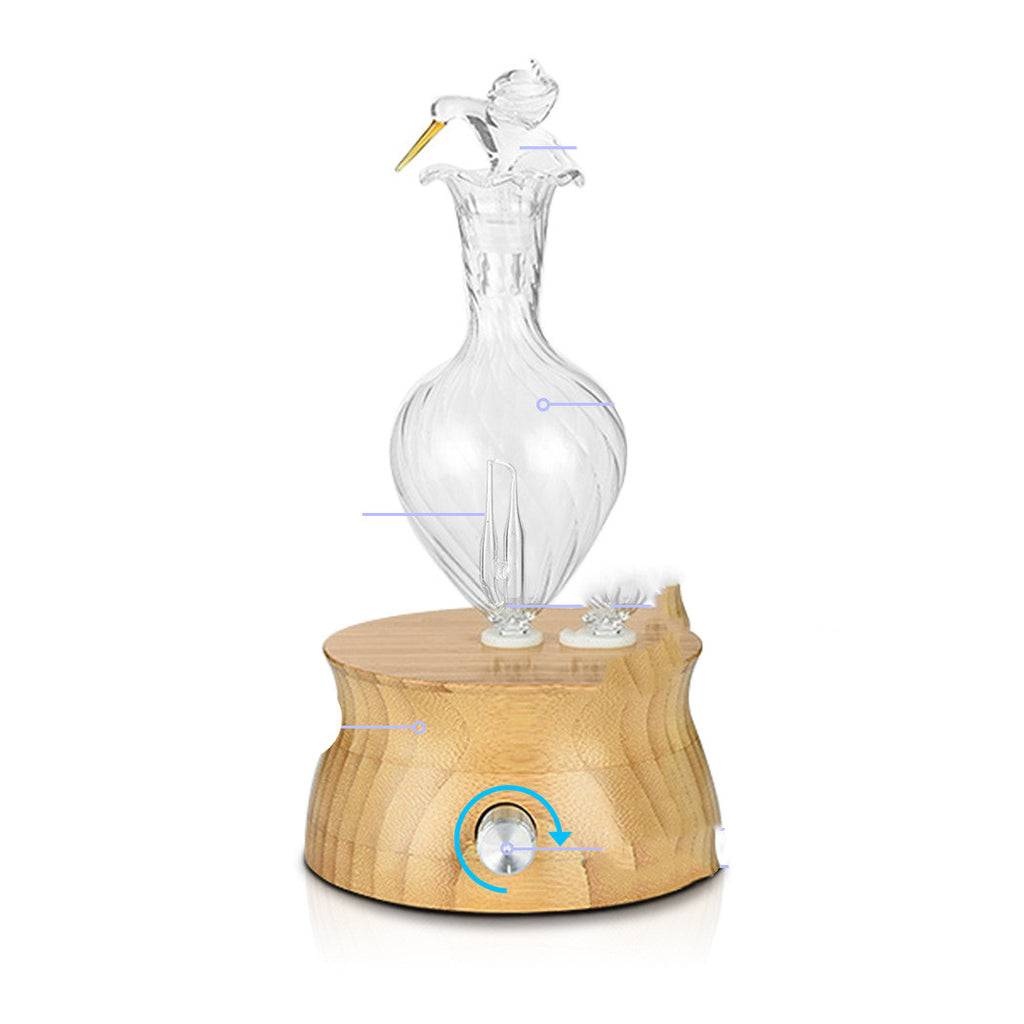 Pure essential oil diffuser with natural wood base and glass top with LED lights
