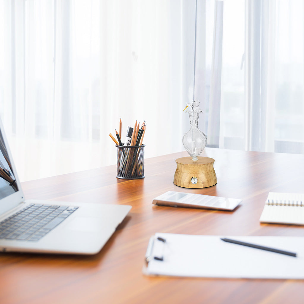 Wood and glass aroma diffuser with ambient LED mood lighting for aromatherapy