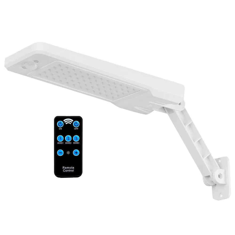 Solar LED security light with remote control illuminating pathway and entryway at night