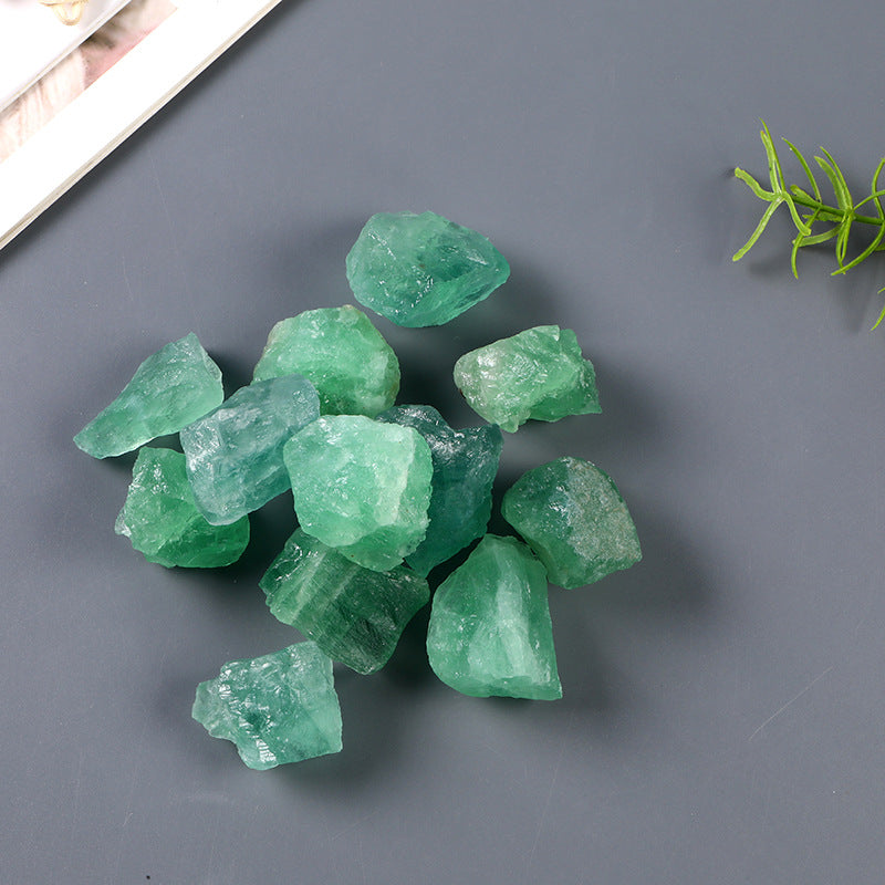 Natural green fluorite rough crystal with visible formations for chakra balancing
